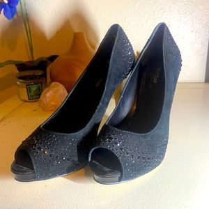 Barely worn black heels with crystal details!